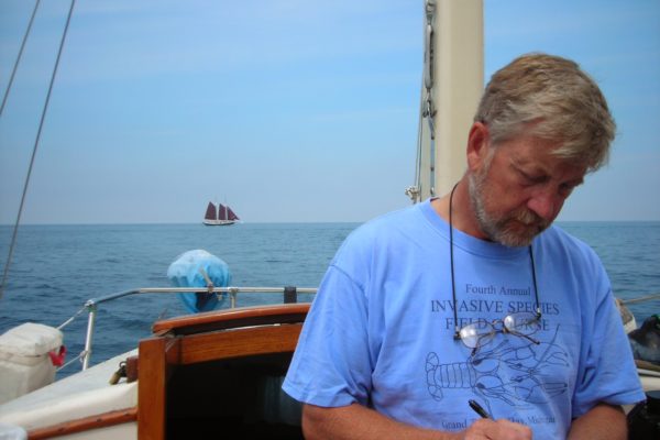 Founder with schooner in background