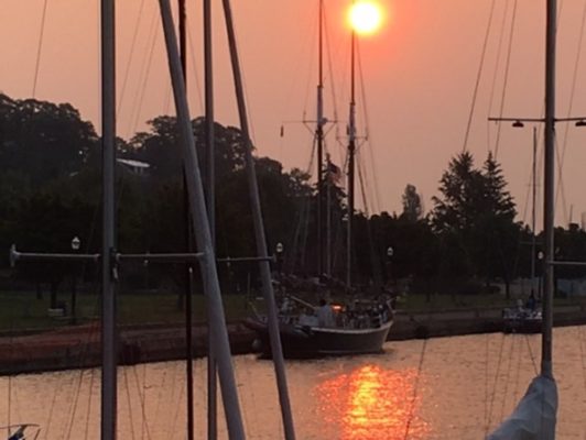 schooner at dock at sunset