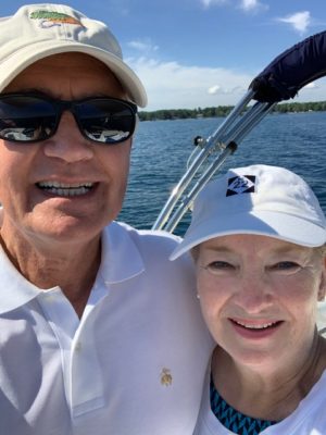 author and husband on boat