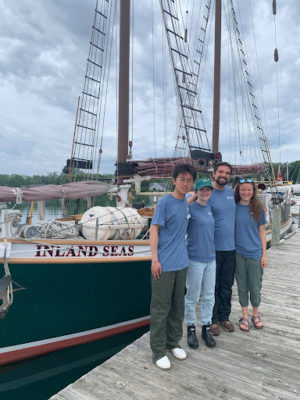 Research team on dock at ship