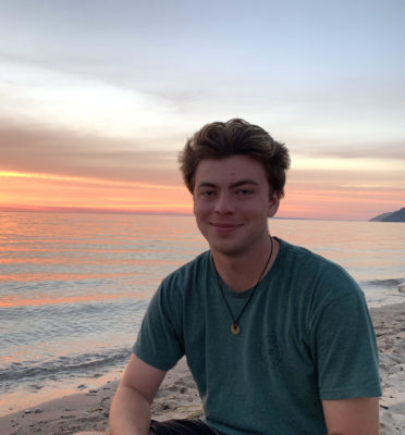 Caleb's connection with the Great Lakes  often happens sitting on the beach during sunset.